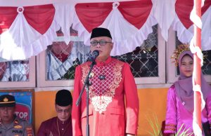 Peringatan HGN dan HUT PGRI di Kabupaten Gorontalo Diwarnai dengan Nuansa Adat