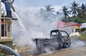 Tanggap Cepat Pani Gold Mine, Kebakaran Mobil Pick Up diDesa Hulawa Berhasil Dipadamkan